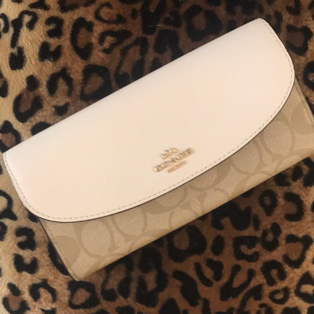 Brand new in box. Coach wallet